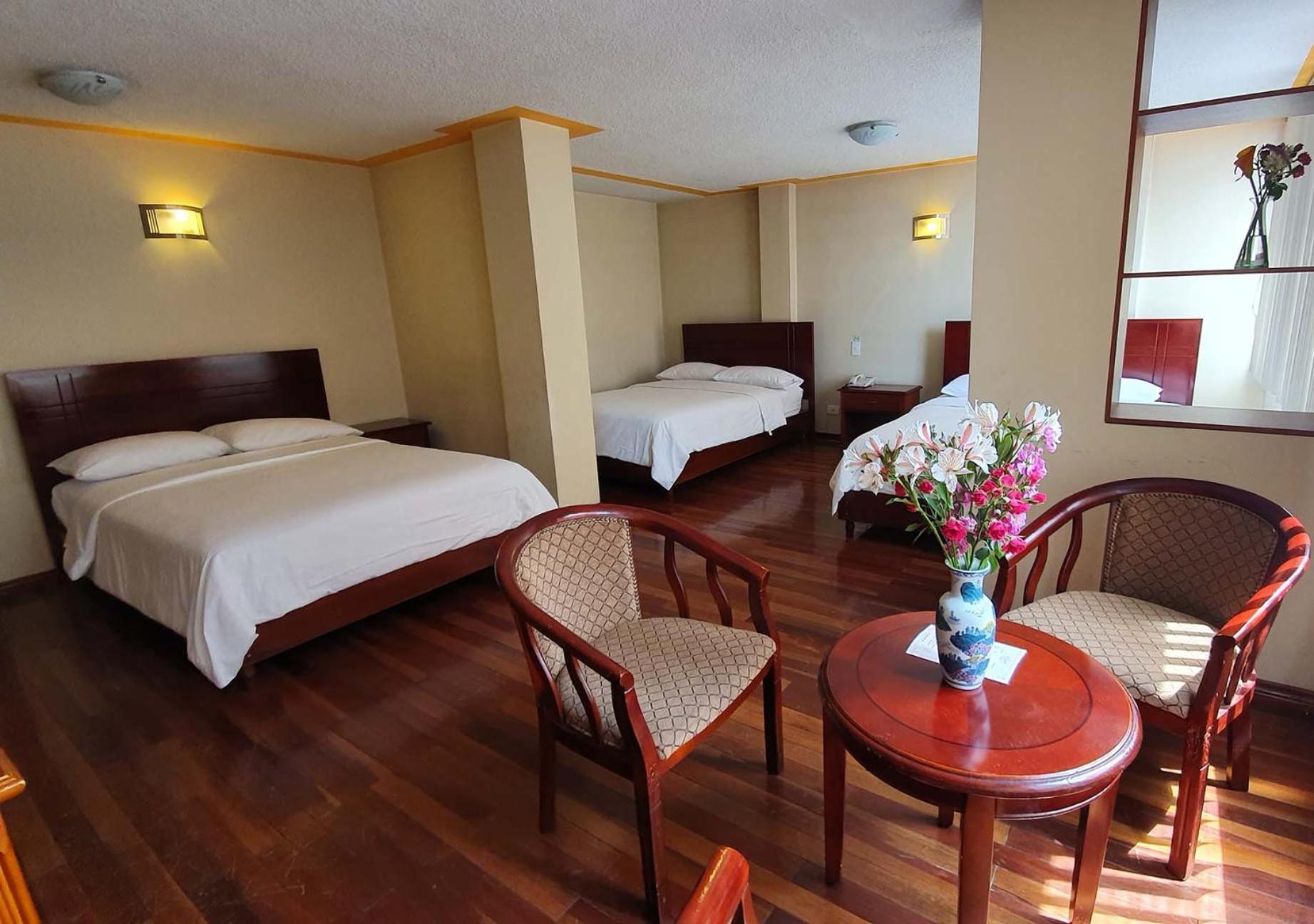 Hotel Lottus Quito Quarto foto